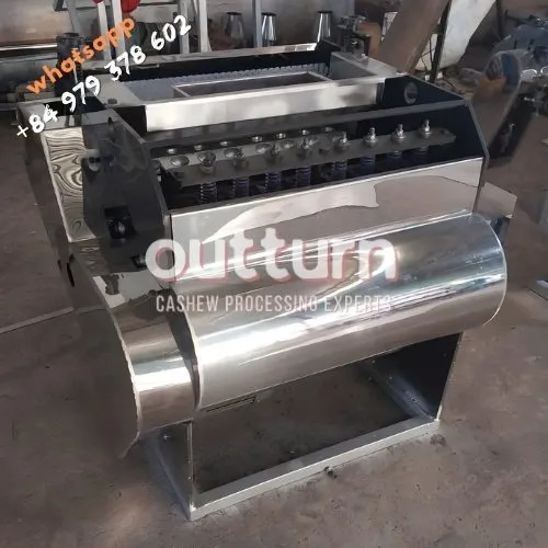 OUTTURN 10-head cashew nut cutting machine with ten rotary cutting cups on a steel frame
