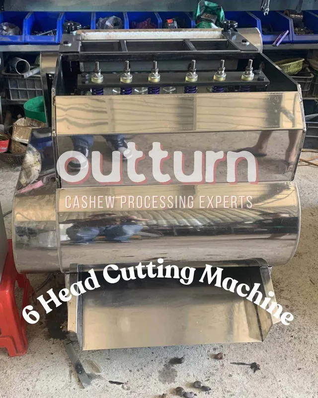 OUTTURN 6-head cashew nut cutting machine with six rotary cutting stations on a factory floor