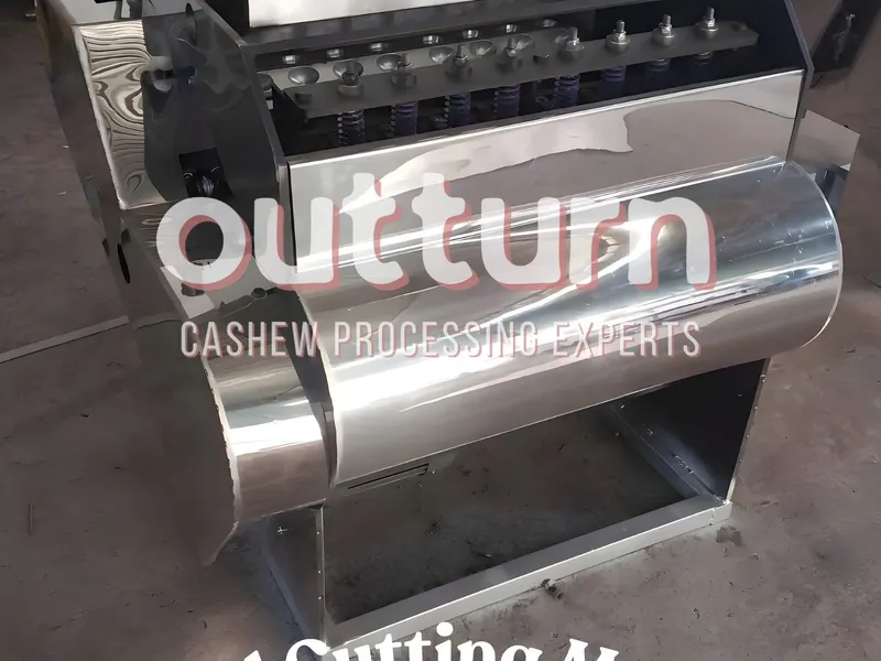 OUTTURN 8-head cashew nut cutting machine showing eight rotary cutting cups arranged around the central turret
